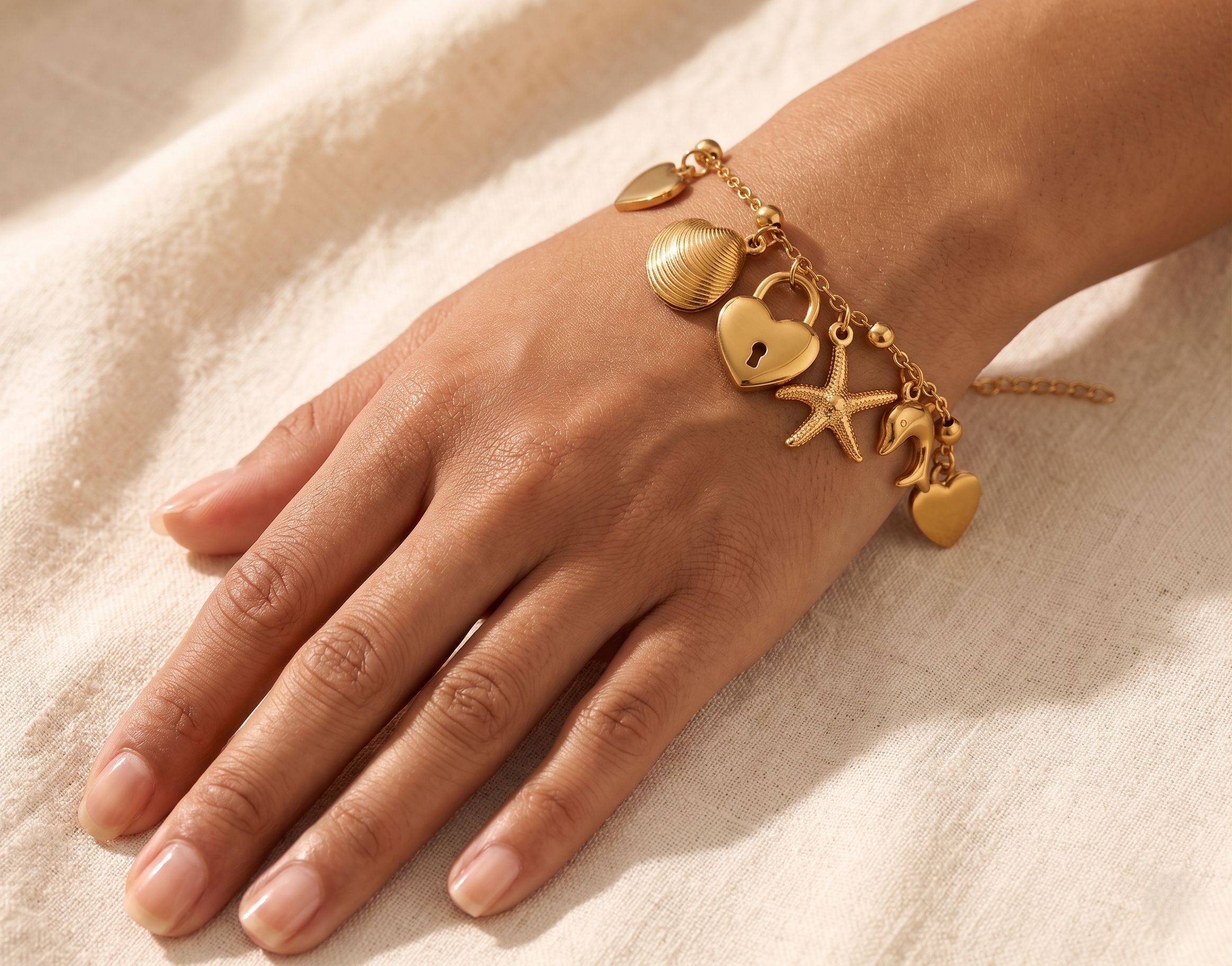 Marina 18k gold plated ocean charm bracelet